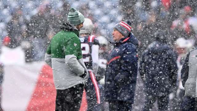 New England Patriots head coach Bill Belichick and New York Jets quarterback Aaron Rodgers