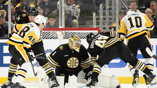 Boston Bruins goaltender Jeremy Swayman and defenseman Matt Grzelcyk