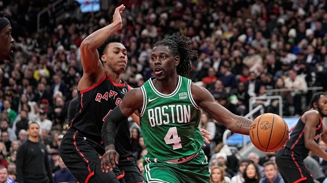 Boston Celtics guard Jrue Holiday and Toronto Raptors forward Scottie Barnes