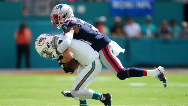 Miami Dolphins wide receiver Braxton Berrios and New England Patriots defensive back Jonathan Jones