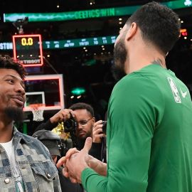 Memphis Grizzlies guard Marcus Smart and Boston Celtics forward Jayson Tatum