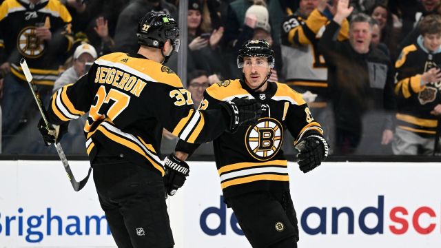 Boston Bruins winger Brad Marchand and former Bruins center Patrice Bergeron
