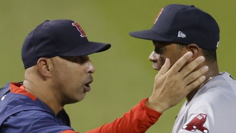 Boston Red Sox manager Alex Cora and third baseman Rafael Devers
