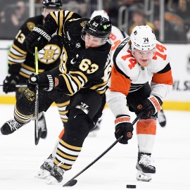 Boston Bruins forward Brad Marchand and Philadelphia Flyers defenseman Owen Tippet