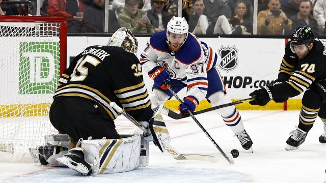 Boston Bruins goalie Linus Ullmark and Edmonton Oilers forward Connor McDavid
