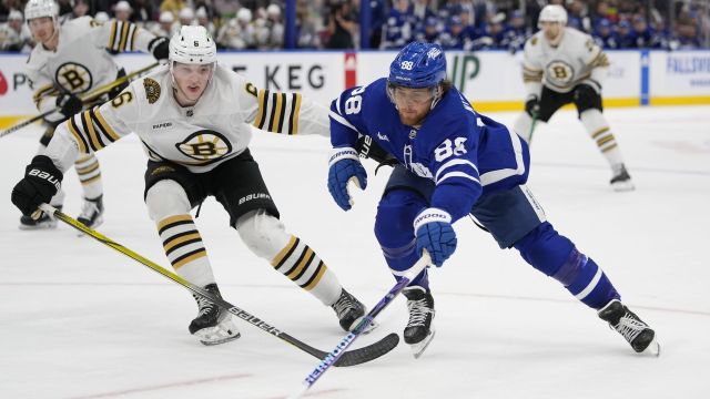 Boston Bruins defenseman Mason Lohrei and Toronto Maple Leafs forward William Nylander