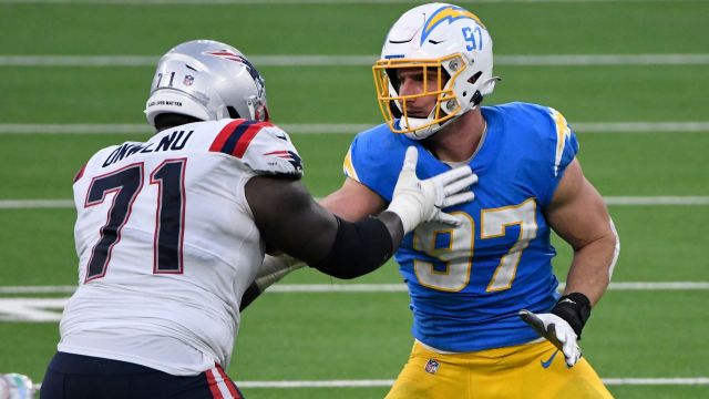 New England Patriots offensive lineman Mike Onwenu and Los Angeles Chargers defensive lineman Joey Bosa