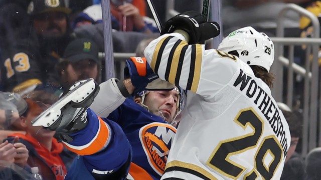 Boston Bruins defenseman Parker Wotherspoon and New York Islanders forward Kyle Palmieri