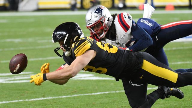Pittsburgh Steelers tight end Pat Freiermuth and New England Patriots safety Kyle Dugger