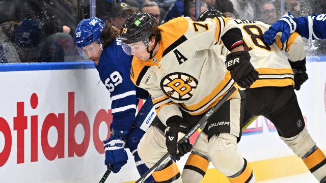 Toronto Maple Leafs forward Tyler Bertuzzi, Boston Bruins defenseman Charlie McAvoy