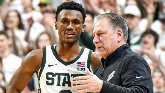 Michigan State Spartans guard Tyson Walker and head coach Tom Izzo