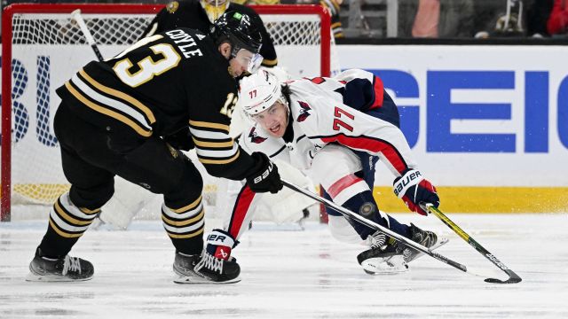 Boston Bruins center Charlie Coyle and Washington Capitals right wing T.J. Oshie