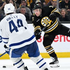 Boston Bruins forward Charlie Coyle and Toronto Maple Leafs defenseman Morgan Rielly
