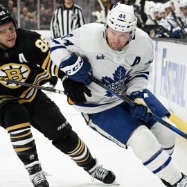 Boston Bruins right wing David Pastrnak and Toronto Maple Leafs defenseman Morgan Rielly