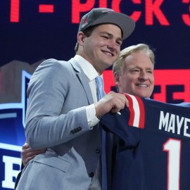 New England Patriots quarterback Drake Maye and NFL commissioner Roger Goodell