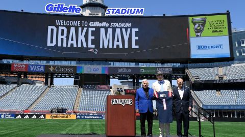 New England Patriots quarterback Drake Maye, owner Robert Kraft and team president Jonathan Kraft