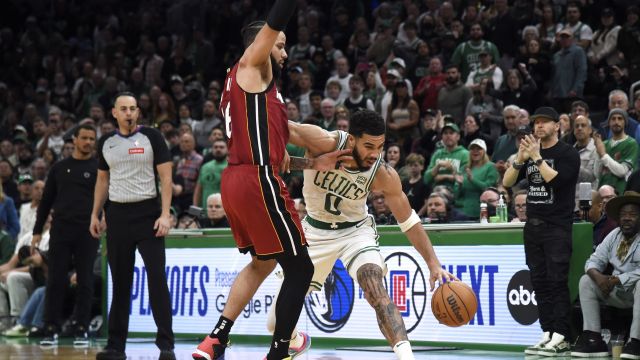 Boston Celtics forward Jayson Tatum and Miami Heat forward Caleb Martin