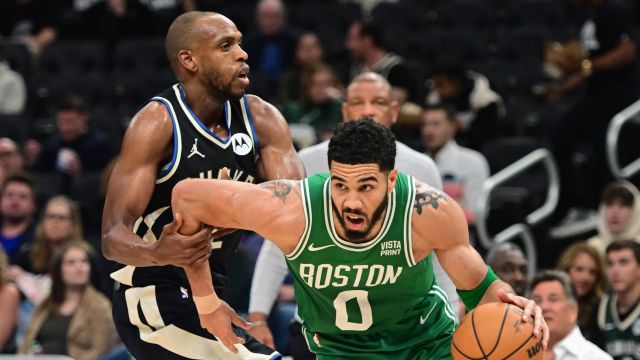 Boston Celtics forward Jayson Tatum and Milwaukee Bucks forward Khris Middleton