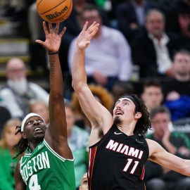 Boston Celtics guard Jrue Holiday and Miami Heat guard Jaime Jaquez Jr.