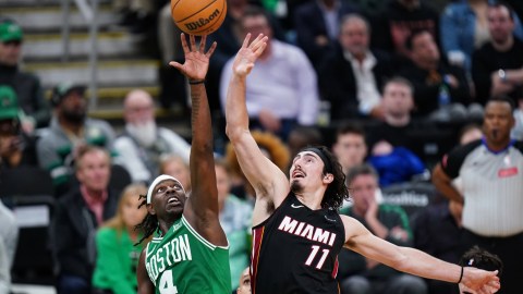 Boston Celtics guard Jrue Holiday and Miami Heat guard Jaime Jaquez Jr.