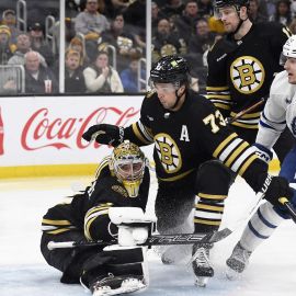 Toronto Maple Leafs forward Matthew Knies and Boston Bruins goalie Jeremy Swayman