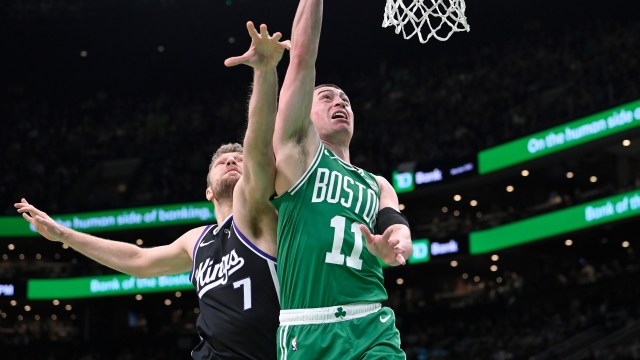 Boston Celtics guard Payton Pritchard and Sacramento Kings forward Sasha Vezenkov
