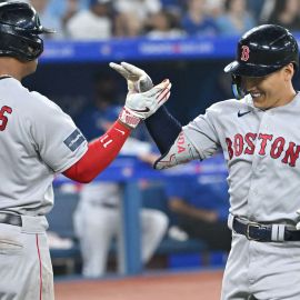 Boston Red Sox third baseman Rafael Devers and outfielder Masataka Yoshida