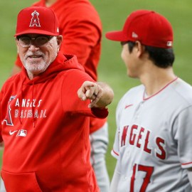 Former Los Angeles Angels manager Joe Maddon and designated hitter Shohei Ohtani