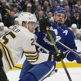 Boston Bruins defenseman Brandon Carlo, Toronto Maple Leafs forward Auston Matthews