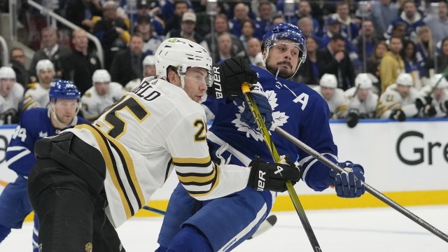 Boston Bruins defenseman Brandon Carlo, Toronto Maple Leafs forward Auston Matthews