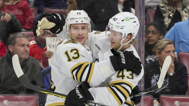 Boston Bruins forwards Charlie Coyle, Danton Heinen