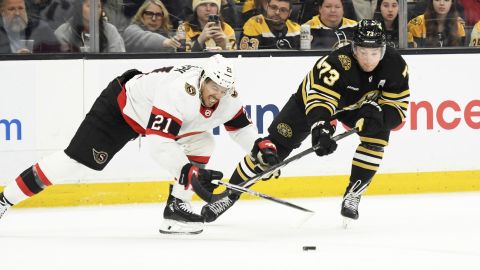 Boston Bruins defenseman Charlie McAvoy and Ottawa Senators forward Mathieu Joseph