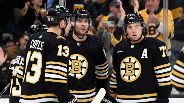 Boston Bruins teammates Charlie Coyle, Pavel Zacha and Charlie McAvoy