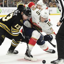 Boston Bruins forward Charlie Coyle and Florida Panthers forward Anton Lundell