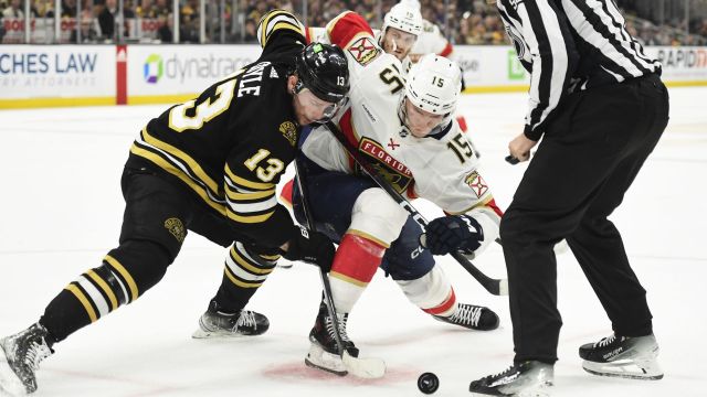 Boston Bruins forward Charlie Coyle and Florida Panthers forward Anton Lundell