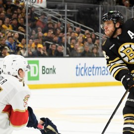 Boston Bruins forward David Pastrnak and Florida Panthers defenseman Niko Mikkola