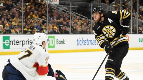 Boston Bruins forward David Pastrnak and Florida Panthers defenseman Niko Mikkola