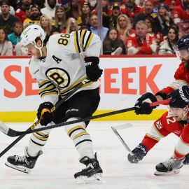 Boston Bruins forward David Pastrnak and Florida Panthers defenseman Aaron Ekblad