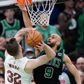 Boston Celtics guard Derrick White and Cleveland Cavaliers forward Dean Wade