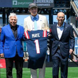 New England Patriots quarterback Drake Maye, owner Robert Kraft and team president Jonathan Kraft