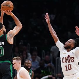 Boston Celtics forward Jayson Tatum and Cleveland Cavaliers guard Darius Garland