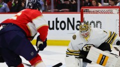 Boston Bruins goaltender Jeremy Swayman and Florida Panthers forward Aleksander Barkov