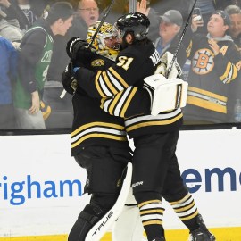 Boston Bruins goaltender Jeremy Swayman and forward Pat Maroon