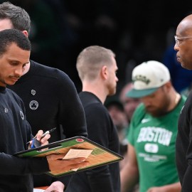 Boston Celtics head coach Joe Mazzulla and assistant Sam Cassell