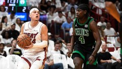 Boston Celtics guard Jrue Holiday and Miami Heat guard Tyler Herro