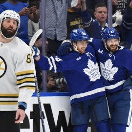 Boston Bruins forward Pat Maroon and Toronto Maple Leafs players William Nylander and Timothy Liligren