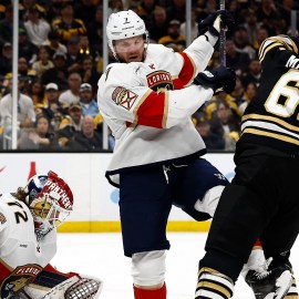 Boston Bruins forward Pat Maroon and Florida Panthers defenseman Dmitry Kulikov and goaltender Sergei Bobrovsky