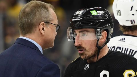 Florida Panthers head coach Paul Maurice and Boston Bruins left wing Brad Marchand