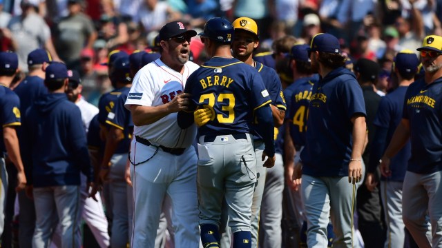 Boston Red Sox game planning coordinator/catching coach Jason Varitek, Milwaukee Brewers first base coach Quintin Berry