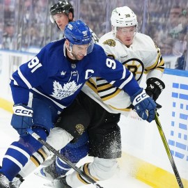 Boston Bruins forward Morgan Geekie, Toronto Maple Leafs forward John Tavares